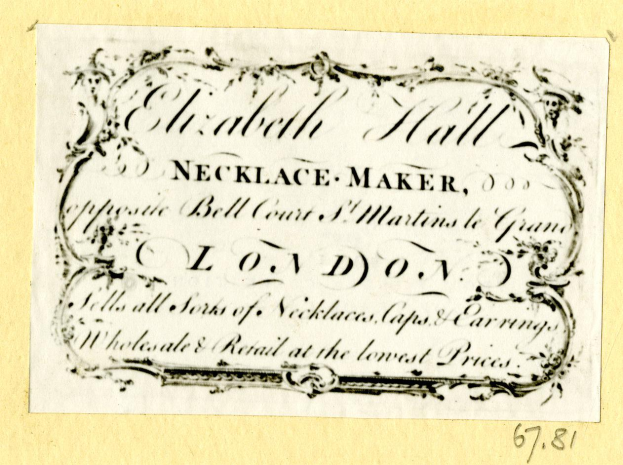 Eine alte Visitenkarte mit einem Bild eines Schmuckherstellers und Text, der seine Dienstleistungen beschreibt.